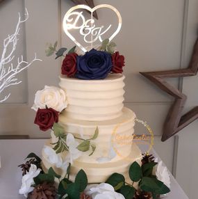 Three Tier WEdding Cake with Artificial Flowers