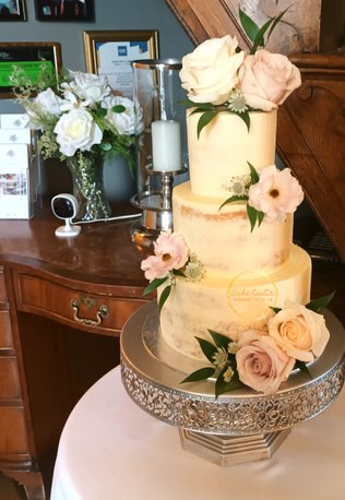 Semi-naked Wedding cake with Flowers | Gloucestershire Wedding Cakes | Semi-naked Wedding Cake