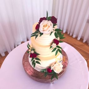Three Tier Buttercream Wedding Cake and Flowers
